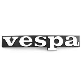 TARGHETTA SCRITTA 'VESPA' SCUDO ANTERIORE INTERASSE 55mm PIAGGIO PK 50 125 S XL